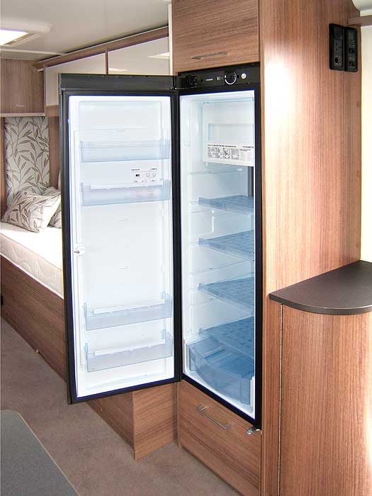 The large capacity fridge with freezer top box.
